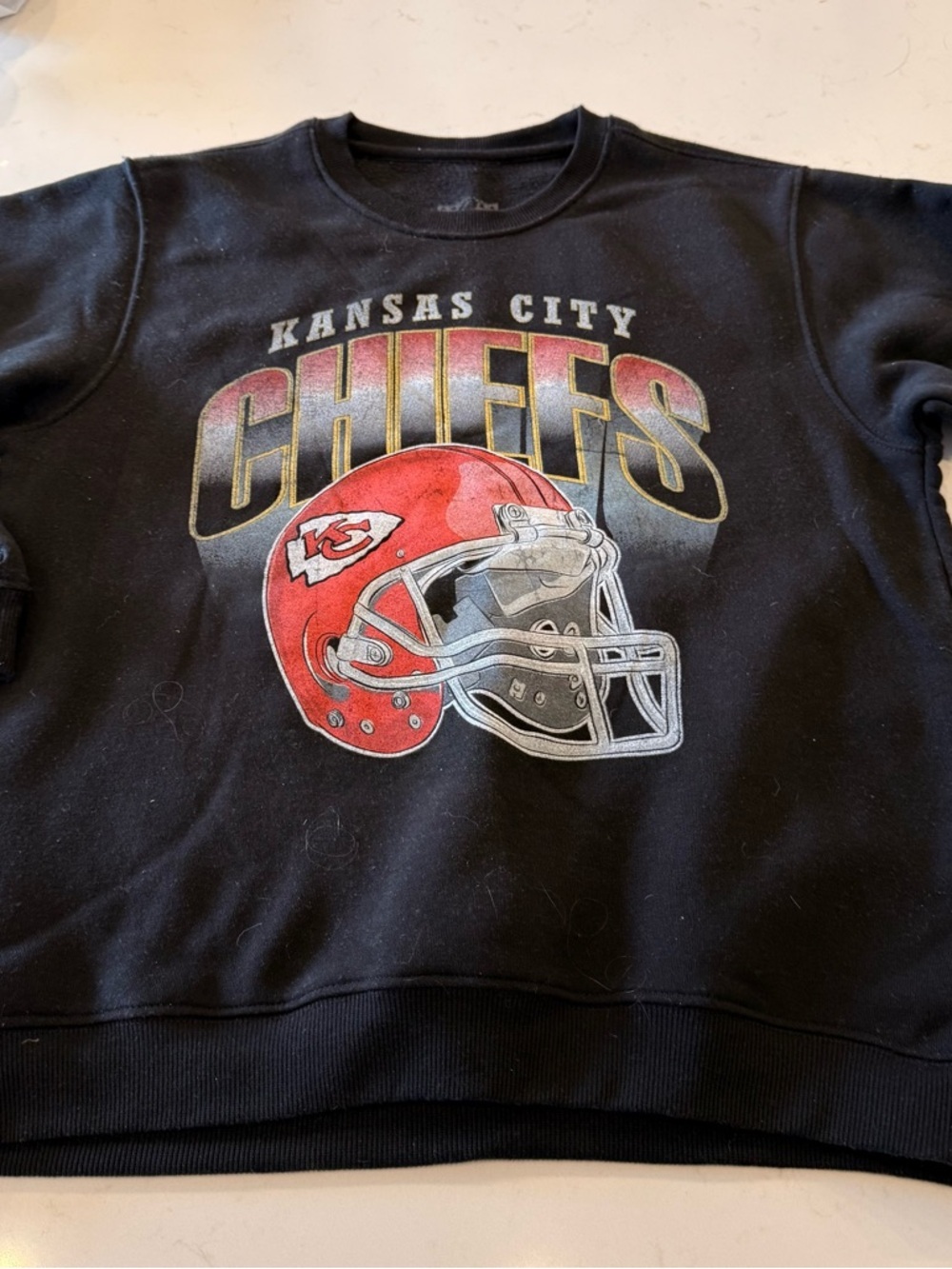 NFL Kansas City Chiefs Black Sweatshirt with Red Helmet Graphic